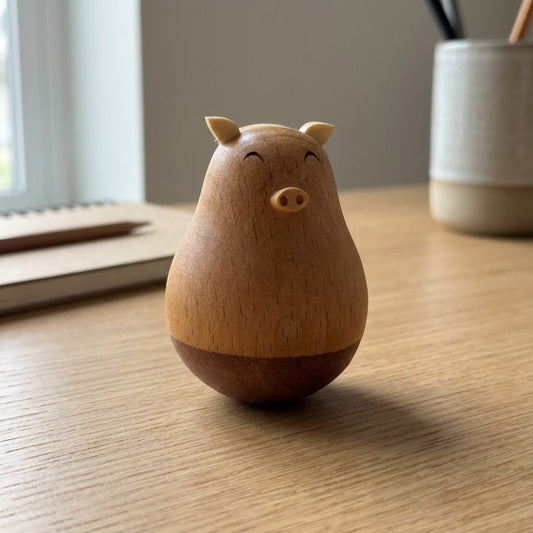 Wooden Cute Rocking Desk Figure placed on a tabletop as a funny desk gadget