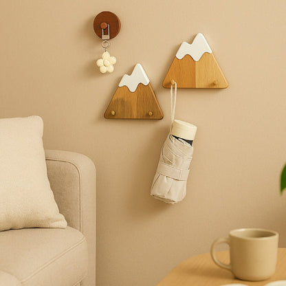 Wooden wall hook mounted on a wall for simple wall decor